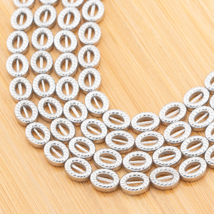 Perforierter ovaler silberner Hämatit mit Marinara-Textur, 8 x 10 mm