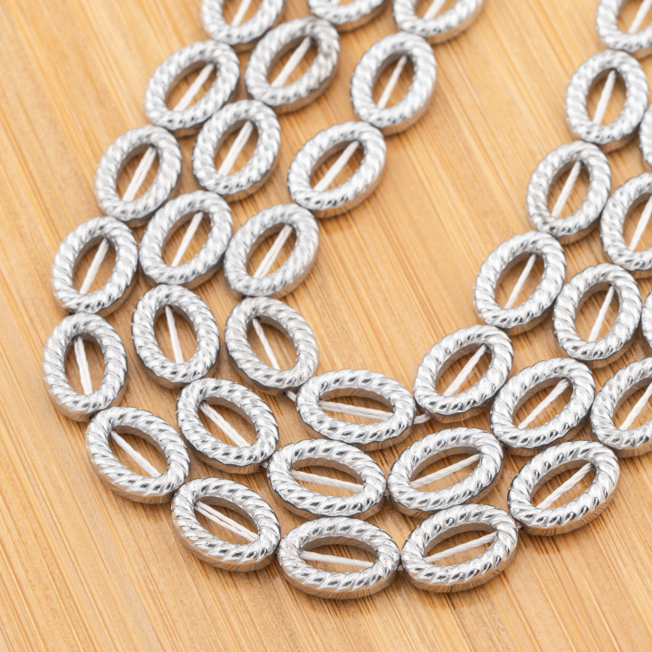 Διάτρητος Οβάλ Ασημί Αιματίτης Με Υφή Marinara 10x14mm