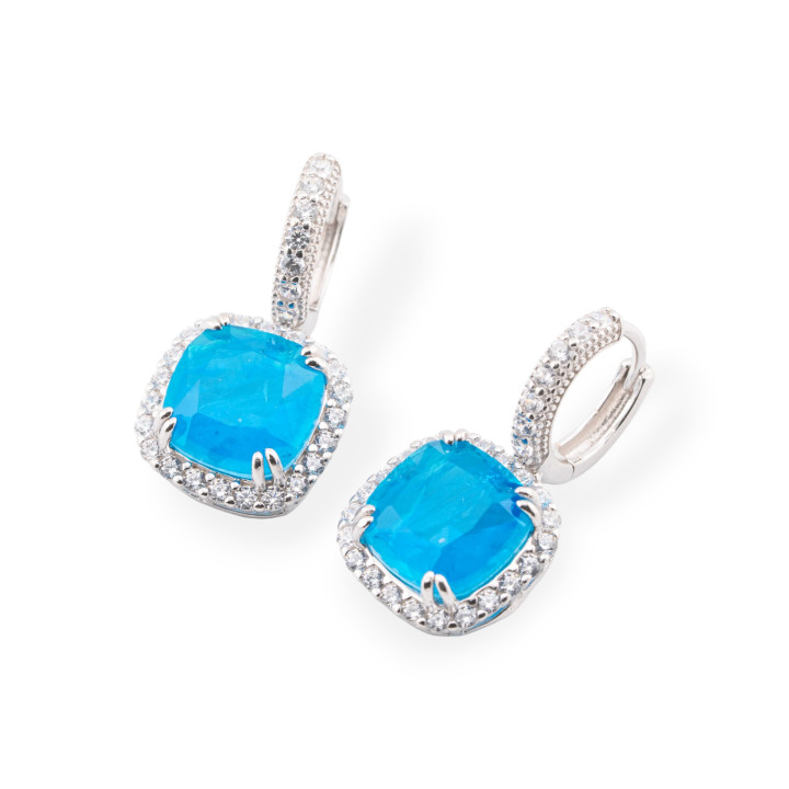 Boucles d'oreilles en argent 925 avec zircons et pierres serties sur un carré bleu
