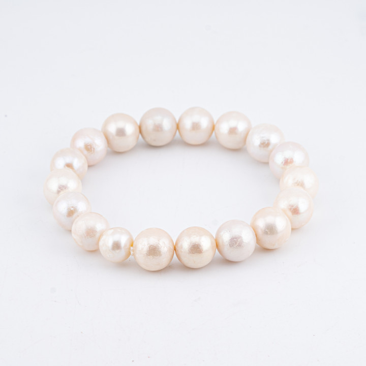 Bracciale Elasticizzato Di Perle Di Fiume Tonde Barocche 10-11mm