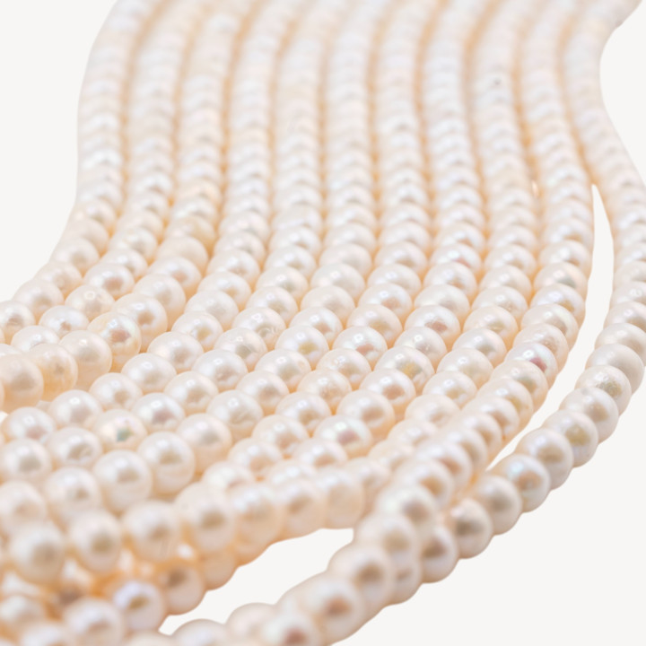 Perle Di Fiume Semiround 5,5-6mm A Bianco