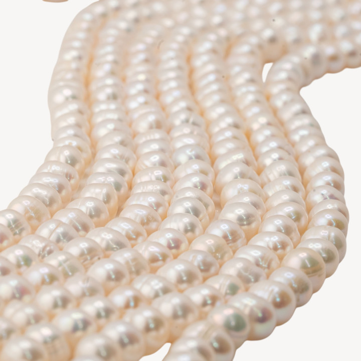 Perle di Fiume Tondo 8-9mm Semiround Rigato Bianco