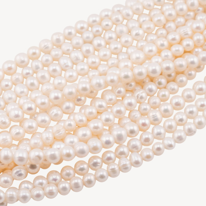 Perle Di Fiume Microperle Semiround A+ 4,5-5,5mm Bianco