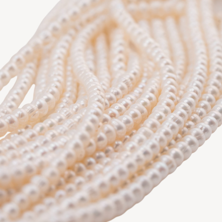 Perle Di Fiume Microperle Semiround A+ 4-4,5mm Bianco