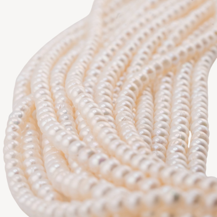 Perle Di Fiume Microperle Semiround A+ 4,5-5,5mm Bianco