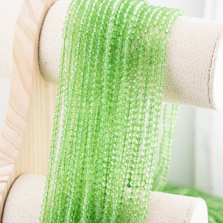 Perline Di Cristalli Rondelle Sfaccettate 4x3mm 10 FILI Su Filo Di Cotone Pronti all'uso Verde Trasparente