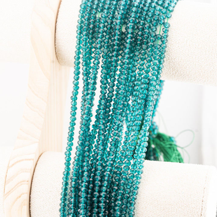 Perline Di Cristalli Rondelle Sfaccettate 4x3mm 10 FILI Su Filo Di Cotone Pronti all'uso Verde Petrolio Trasparente