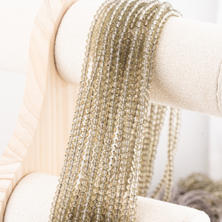 Perline Di Cristalli Rondelle Sfaccettate 4x3mm 10 FILI Su Filo Di Cotone Pronti all'uso Fumé Trasparente